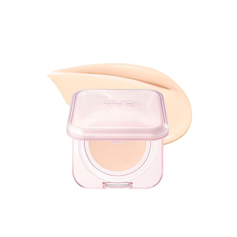 Makeup compact with pink lid and beige cream on a white background