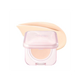 Makeup compact with pink lid and beige cream on a white background