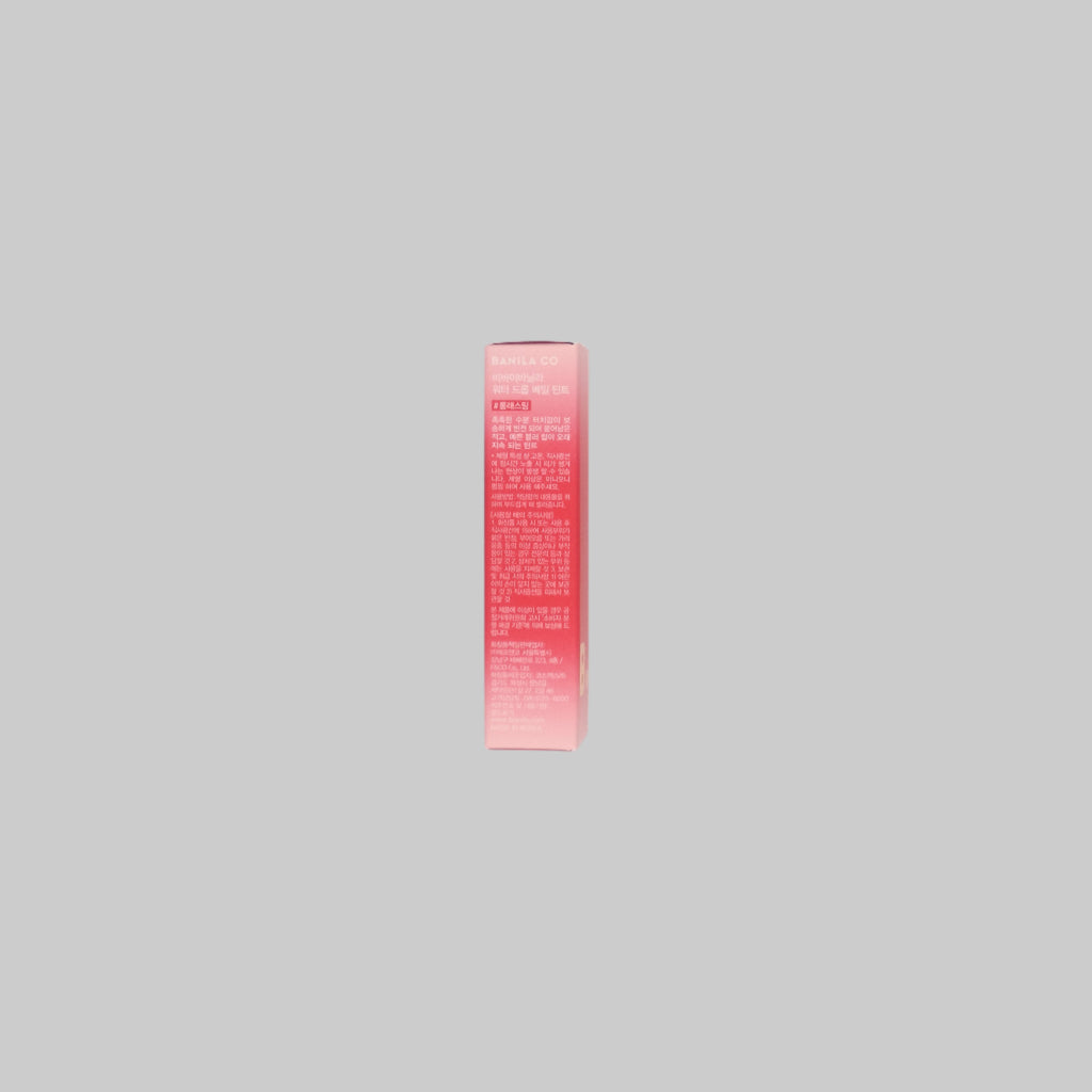 Pink lip balm box on a gray background