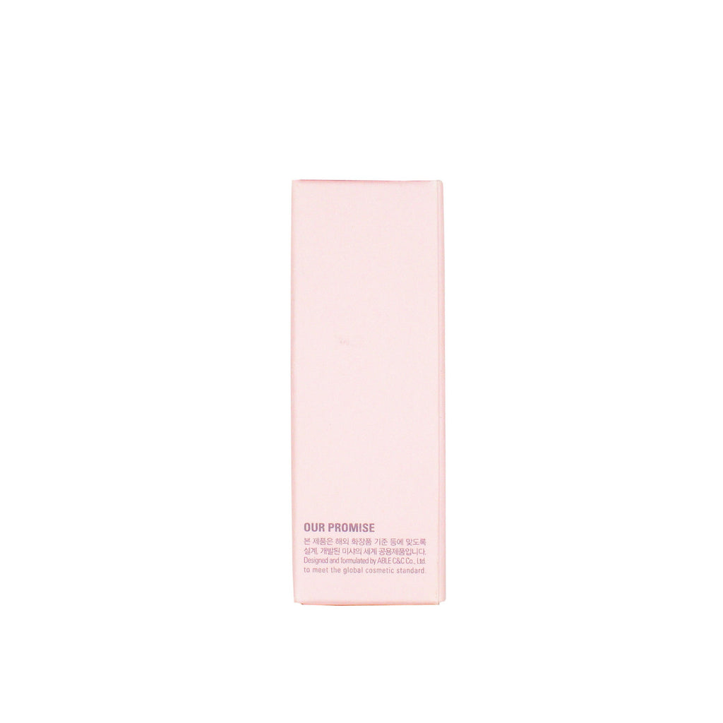 Pink skincare product packaging on a white background