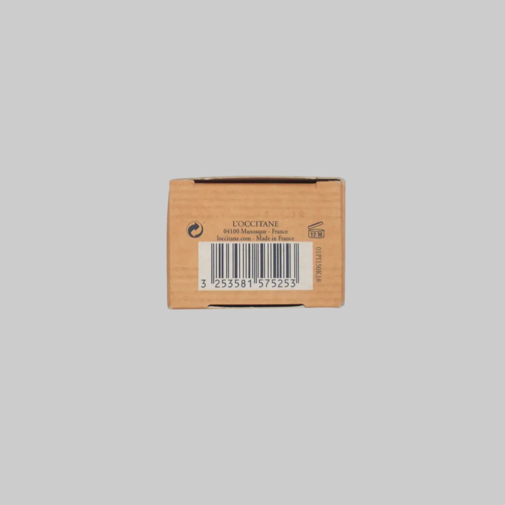Small brown box with a label on a light gray background