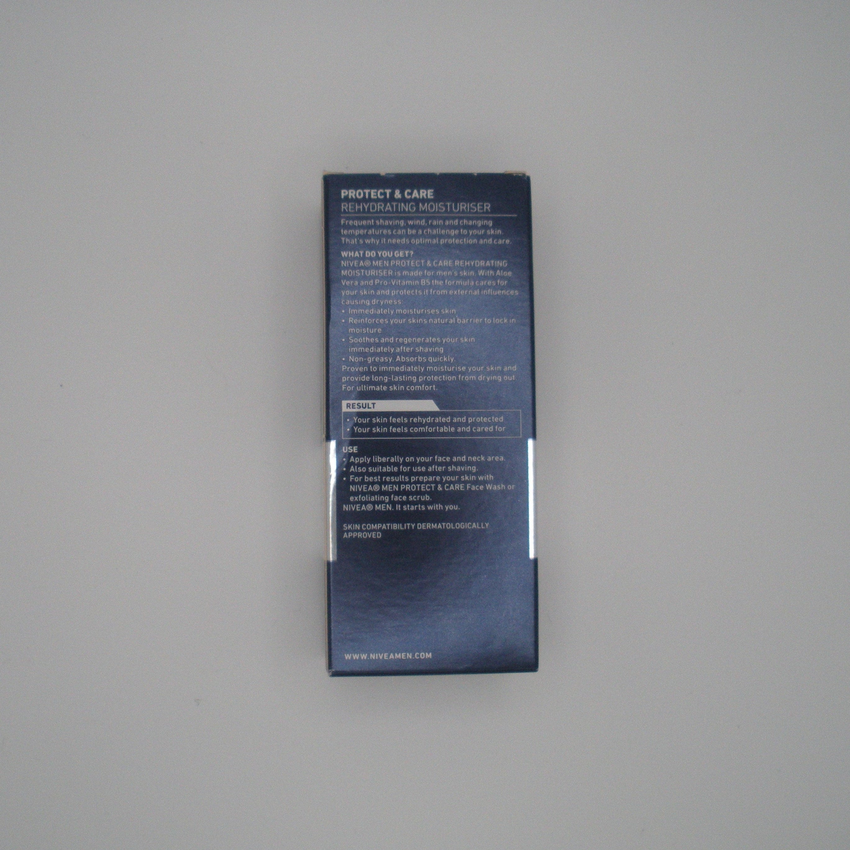 Blue product packaging box on a light gray background