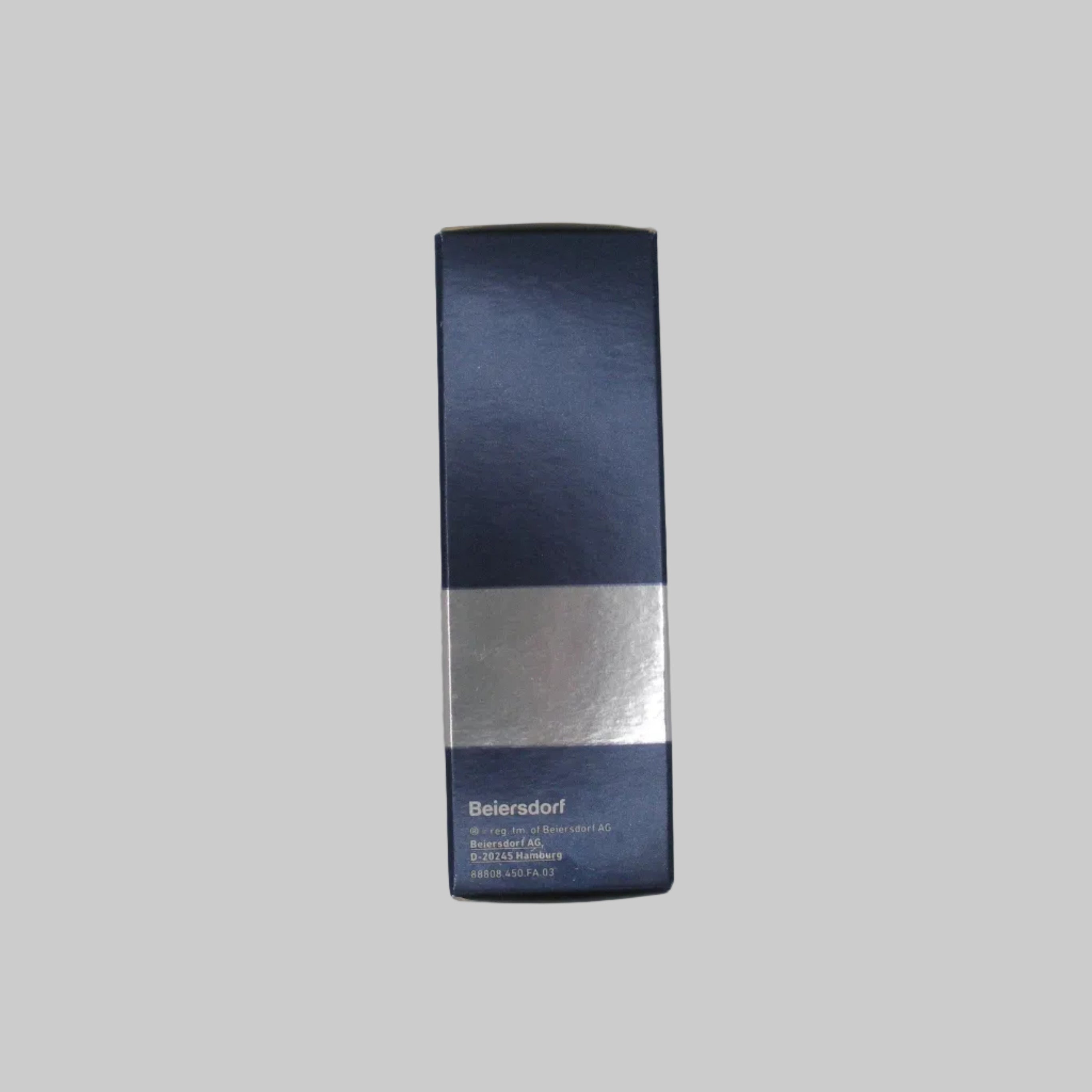 Blue and silver product packaging on a gray background